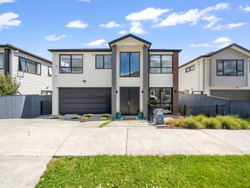 Spacious 7-Bedrooms + 2 Legal Kitchens