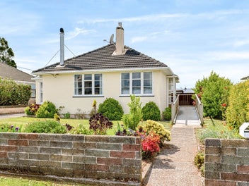 4 Car Garaging and A Warm Home