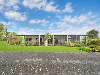 TWO HOMES, ONE OUTSTANDING OPPORTUNITY