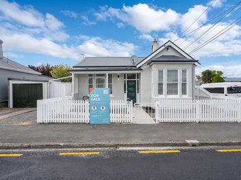 Character, Comfort & Garaging That Delivers!