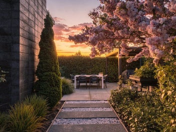 A Standout in Style & Setting!