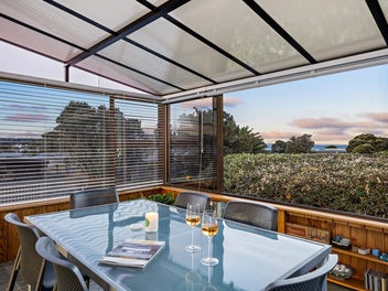 Big Bustling Family Bach with Water Views