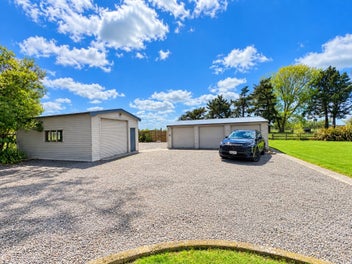 Owners Moving On - Five Acre Opportunity!