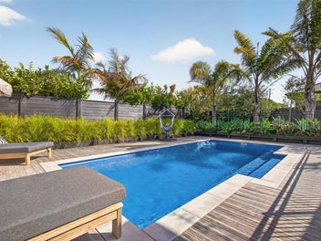 Single Level Luxury With Poolside Living.