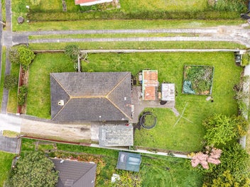 Classic 3-Bedroom, Brick Home with Potential