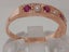 Rose Gold Pearl & Ruby Womens Eternity Ring - Full UK Hallmark Carousel 3