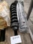 Track Adjuster for Doosan DH55 including a spring and a cylinder PN: 9144656 Carousel 6