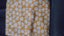 FQ of Orange and Cream Knit fabric as shown Carousel 2