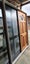 SALE Karaka Green Entranceway with Wooden Door & Sidelight 2 m H x 1.6 m W #SDF2 Carousel 4