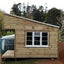 Sleepout Cabin. The Pinnacle Cabin with storage area Carousel 4