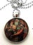 'Gothic Guardian' dragon necklace, by Anne Stokes. Large silver coloured base Carousel 1
