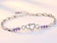 Heart Amethyst CZ Bracelet 18KGP White Gold Carousel 1