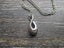 Infinity Memorial Pendant for cremation ash - Stainless Steel Carousel 1
