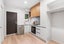 Modern kitchen with recess handles and stone benchtop Carousel 3