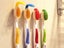 8Pcs Smile Face Toothbrush Cover Holder with Suction Cup Random Color Carousel 3