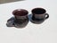 pair of retro handmade pottery coffee cups Carousel 1