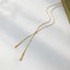 Gold lariat style modern necklace "Milan" Carousel 4