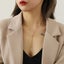 Gold lariat style modern necklace "Milan" Carousel 5