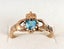 9ct gold with topaz stone claddagh ring . Carousel 3