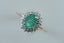 Elegant natural emerald & diamond halo ring in 9ct Carousel 3