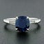 Vintage Platinum 2.85ctw Oval Sapphire and Baguette Diamond Engagement Ring Carousel 1