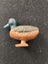 Animal figurines x 12 and a daffodil Carousel 9