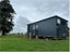 7.0x2.7m self contained cabin tiny home Carousel 3