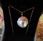 Big baroque pearl with 18k bail and necklace Carousel 1