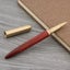 High Quality Copper WOOD RollerBall Pen brass Ebony spinning Red gold BAL CHK29M Carousel 2