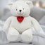 Large White Plush Bear with Heart Carousel 1