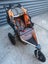 Orange Bob Revolution jogging stroller with accessories Carousel 6