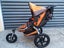 Orange Bob Revolution jogging stroller with accessories Carousel 4