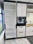 Modern light grey melamine and dark wood-look kitchen flat pack – Showroom Carousel 9