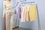 Portable Garment Rack Stainless Steel Foldable Coat Rack Collapsible Travel Rack Carousel 2