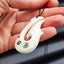 Natural Hand Carved Maori Bone Carving Pendant Necklace - Hook With Paua Inlay Carousel 2