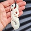 Natural Hand Carved Maori Bone Carving Pendant Necklace - Manaia Hook Carousel 1