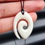 Natural Hand Carved Maori Bone Carving Pendant Necklace - Koru Spiral Carousel 1