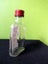 Glass bottle, shaped like a hip flask, 100 ml Carousel 3