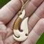 Bound Matau-Koru, handcrafted bone pendant Carousel 1