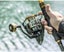 HE7000 Metal Spinning Fishing Reel Left/Right Retrieve 5.2:1 12 Ball Bearings Carousel 3