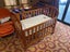 Touchwood cot includes Stokke bumper & sheets Carousel 10