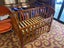 Touchwood cot includes Stokke bumper & sheets Carousel 7