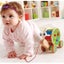Hape: Walk Along Snail Carousel 3