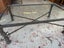 A Quality Bronze Patinated Frame Glass Topped Coffee Table Carousel 8