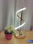 T208 Dimmable Gold Color LED Table Light Carousel 1