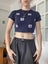 Cute Tommy Hillfiger Jeans crop-top with embellished patches! Carousel 1