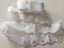 White cotton broderie anglaise trim with variegated edge Carousel 1