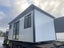 6.0x2.4m self contained cabin tiny home Carousel 4