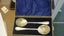 PAIR OF ANTIQUE DECORATIVE SILVER SERVING SPOONS Carousel 1
