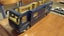 Volkner Expandable Mobil Bus 1:50 by Siku with free Hot Wheels model. Carousel 3